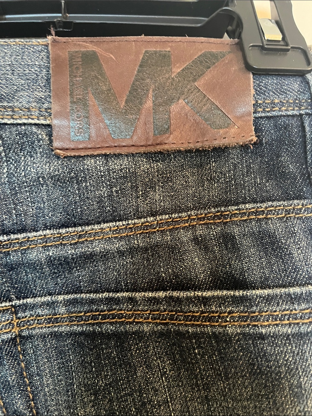 Michael Kors Washed Indigo Denim Jeans with Leather MK Patch
